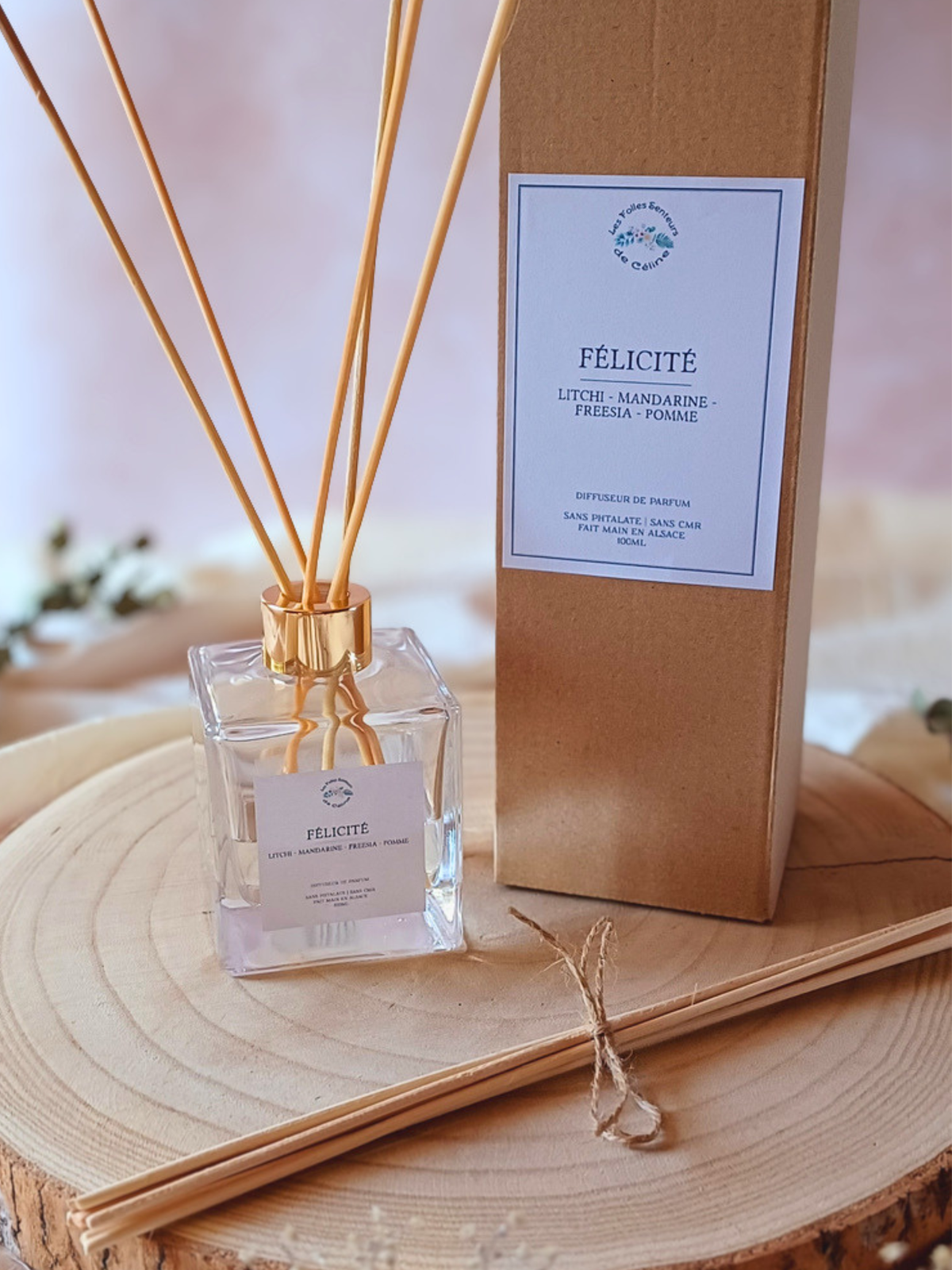 Diffuseur de parfum aux notes de litchi, mandarine, freesia et pomme